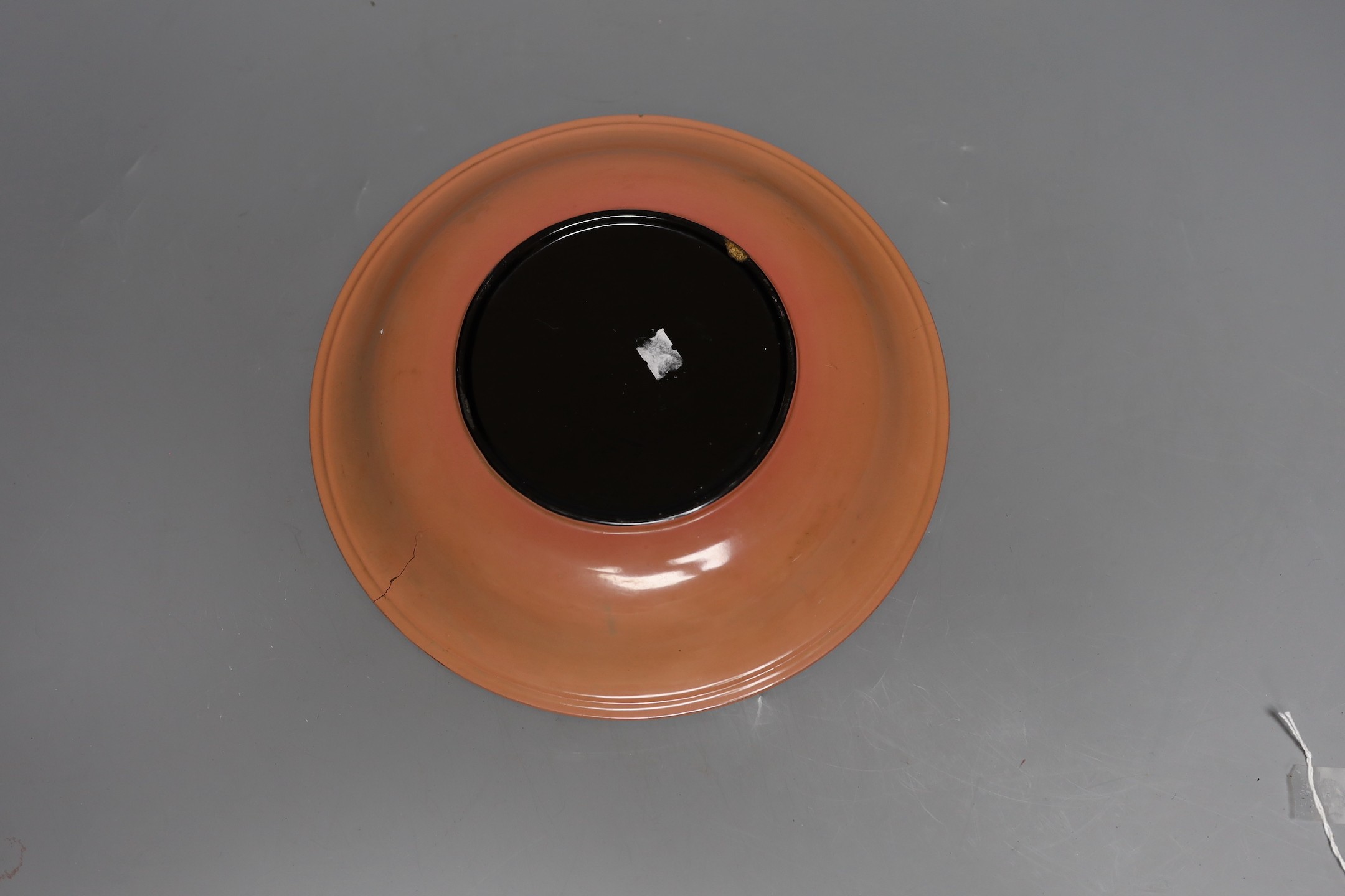 A Chinese green lacquer dish, 24.5cms diameter